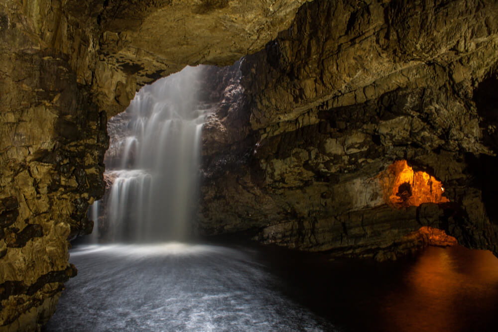 Photo of an underground waterfall in the caves in Upstate NY